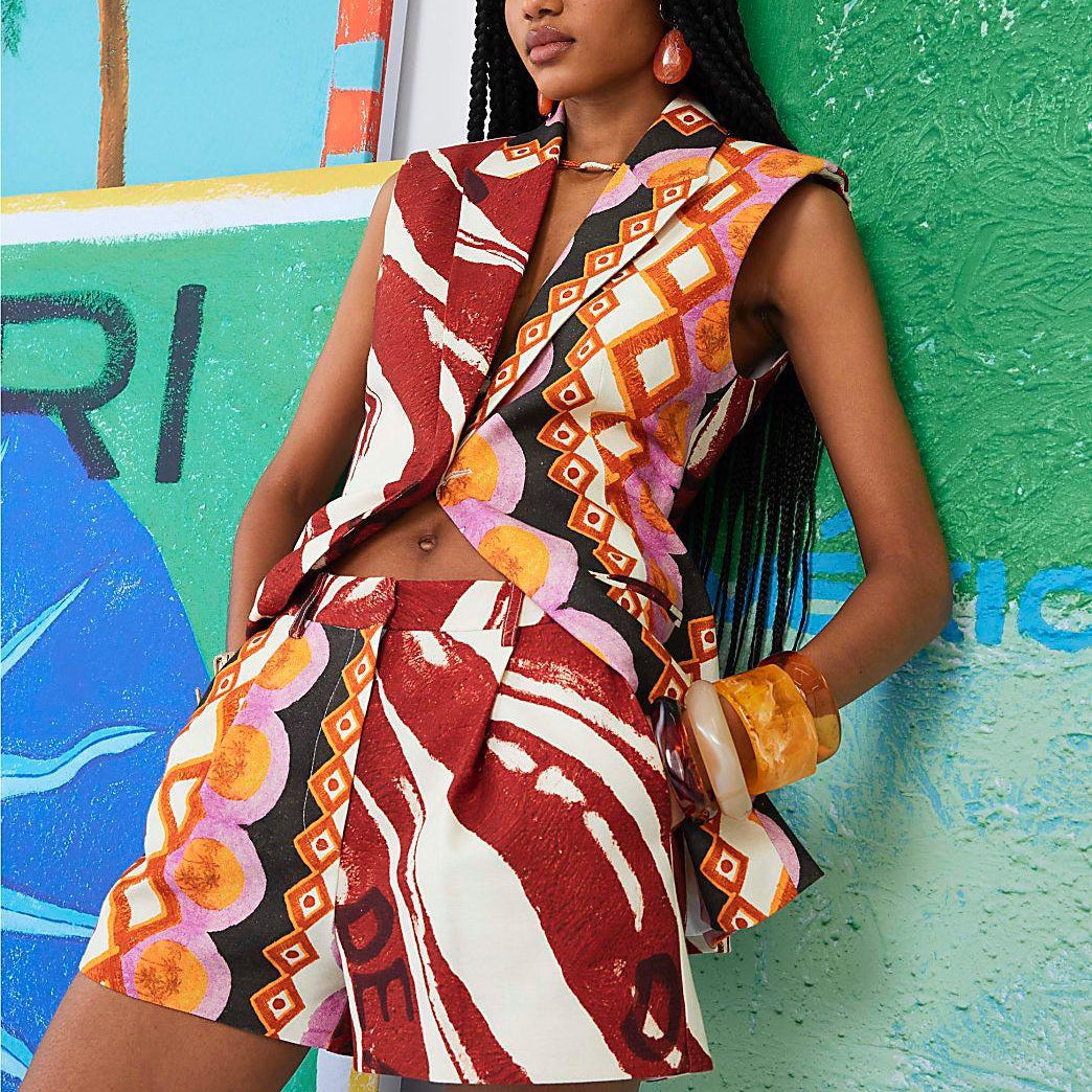 SLEEVELESS TOP WITH ZIPPER SHORTS