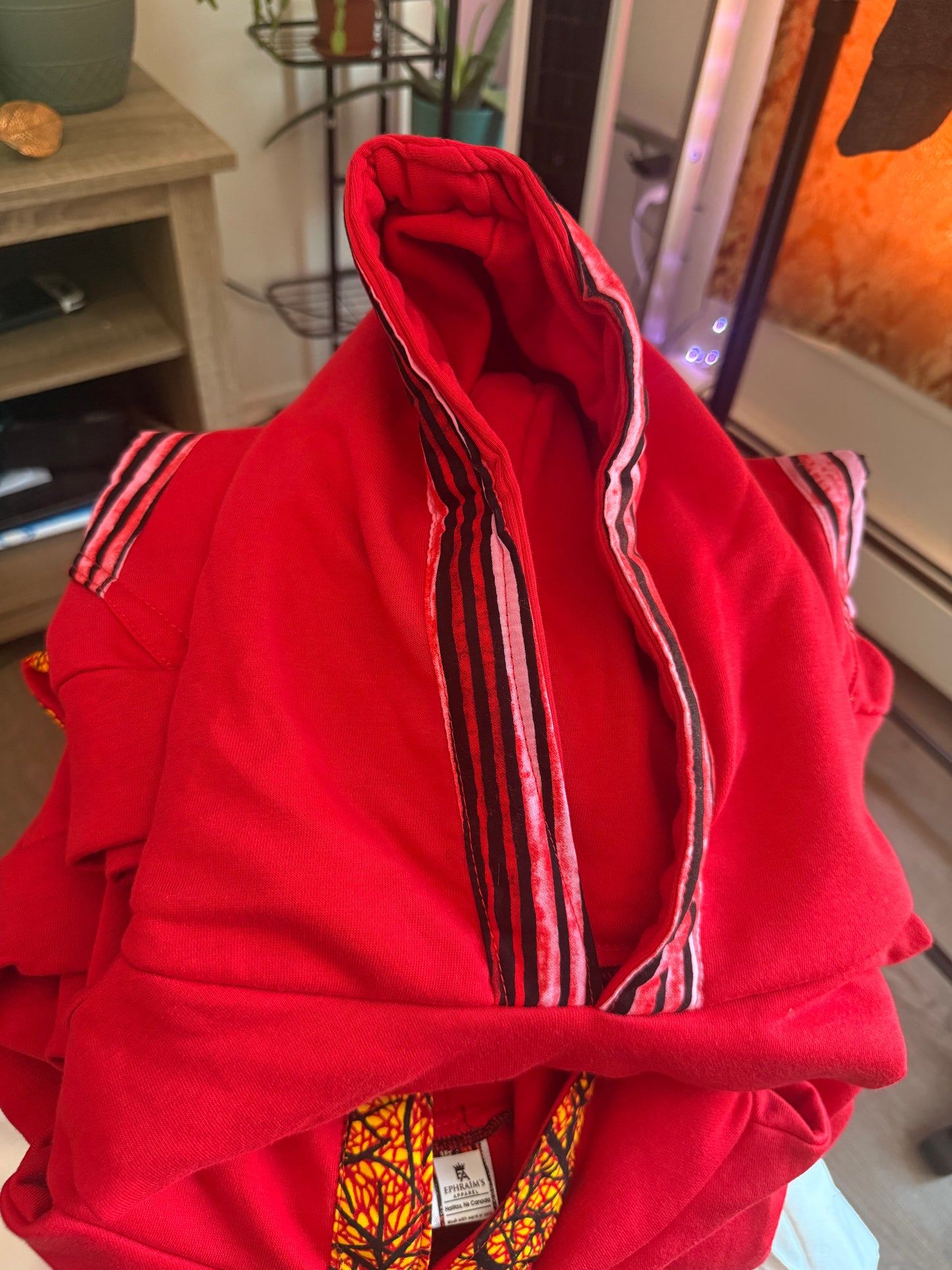 Red hoodie with stripped prints