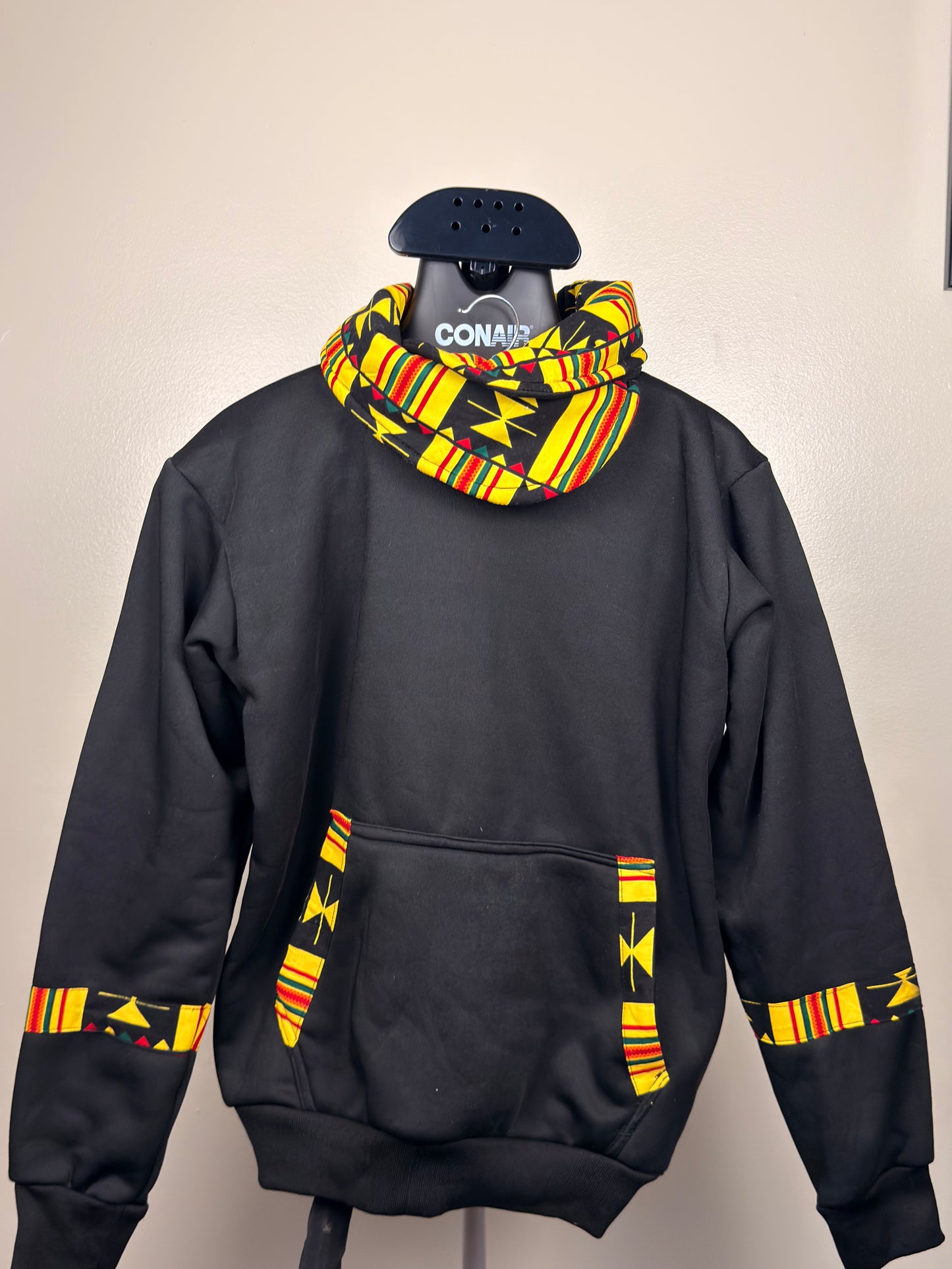 A black Ankara cowl neck hoodie